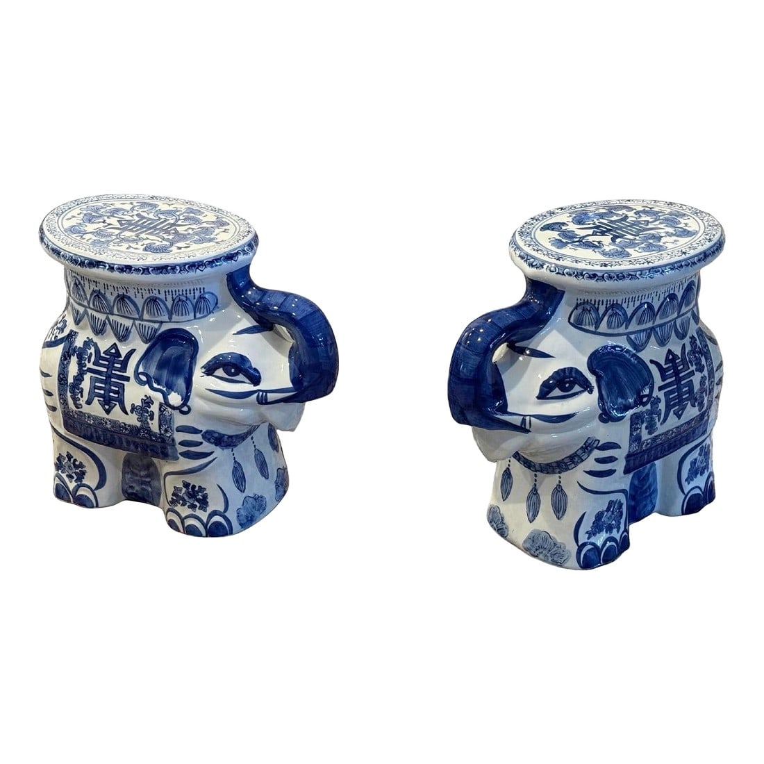 Pair of Chinese Export Blue & White Ceramic Elephant Plant Stands / Garden Stools: Stunning vibrant cobalt blue and white matching Chinese export elephant garden stools or plant stands. Also charming as a side table with stacked books or to place a vase atop with large florals. 