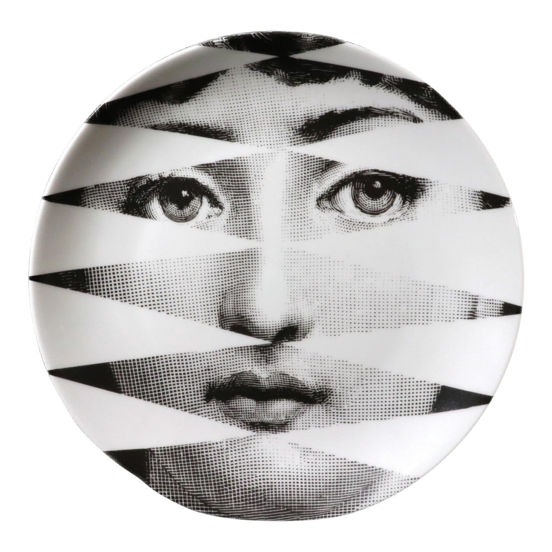 Fornasetti Porcelain Themes & Variation Plate, Pattern Number 46: Fractured Beauty: Fornasetti "Themes & Variations" Plate #46 (Sliced Face) 1990s A dynamic and optical porcelain wall plate from the celebrated "Themes & Variations" (Tema e Variazioni) series by