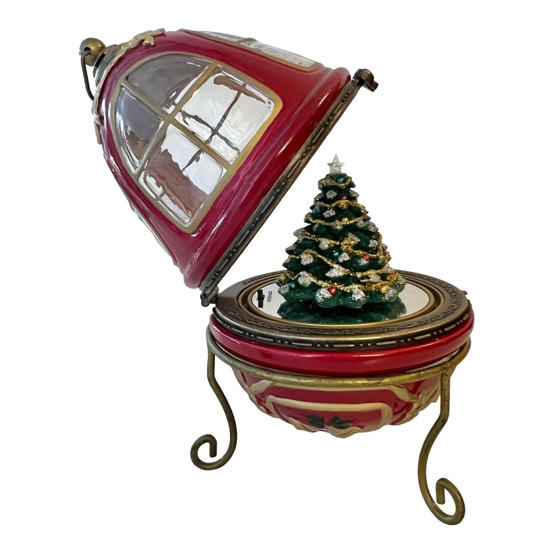 Vintage Christmas Egg Music Box: Mr. Christmas Egg Music Box with Christmas Tree in glass Windows. Hang Ornament on a tree with Red Ribbon or display on included metal Stand. Christmas Tree spins to music as it stands on a mirror.