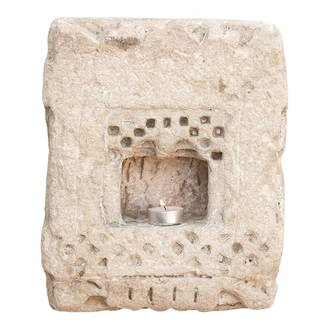 Primitive Carved Stone Inidan Niche: Carved from solid stone, this antique wall niche"”traditionally known as a Gokha"”was originally embedded into the masonry walls of Indian Havelis to shelter oil lamps or small votive