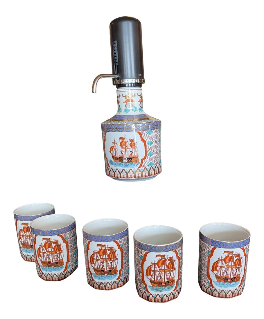 1980s Arita Imari Cocktail Set- 6 Pieces: Arita Decanter Set Six Piece in a Nautical Theme , great Design and colors from the Arita Imari company . Condition: Alterations: Original Condition Unaltered Imperfections: Some Imperfections