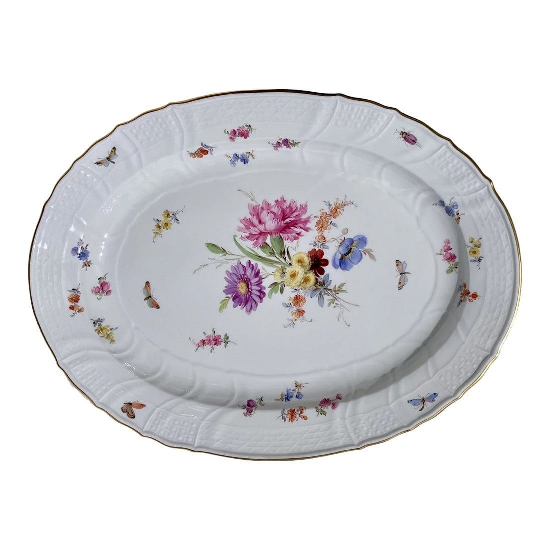 Antique Meissen Porcelain Floral Platter, 19th Century: A distinguished decorative piece with antique charm, perfect for curated interiors or collections. Meissen's New Brandenstien pattern, first introduced in 1744 by Johann Friedrich Eberlinin; the rever