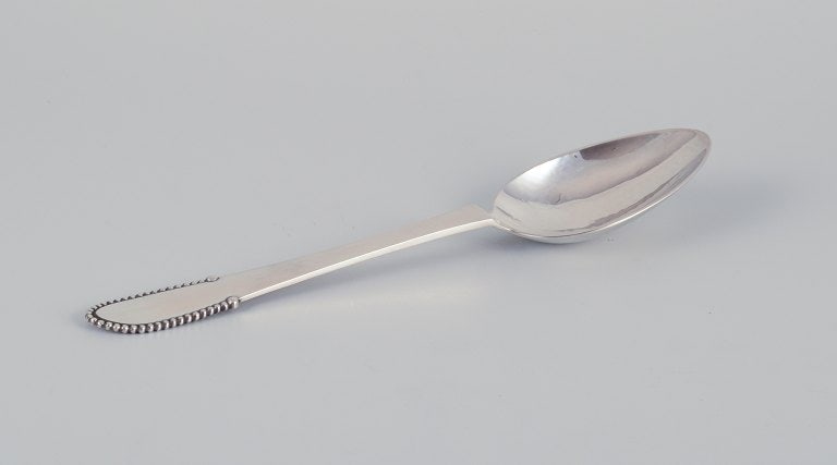 Georg Jensen. Two Beaded tablespoons in 830 silver. - 2
