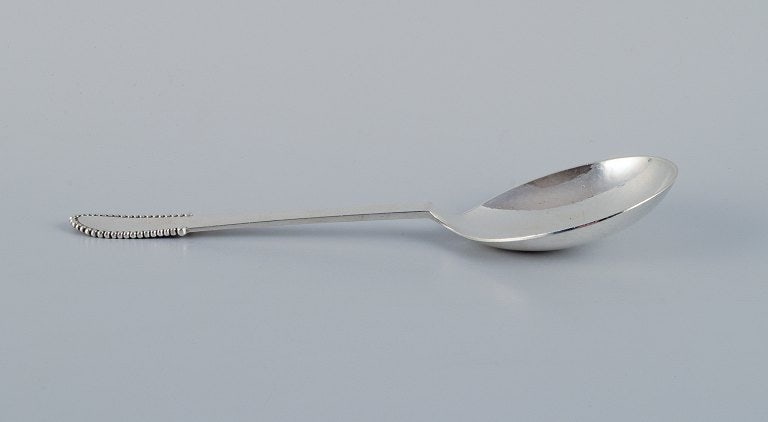 Georg Jensen Beaded. Serving spoon in sterling silver.: Title:Georg Jensen Beaded. Serving spoon in sterling silver. Description:Georg Jensen Beaded. Serving spoon in sterling silver. Post-1945 hallmark. In excellent condition. Dimensions: L 20.6 cm. Reser