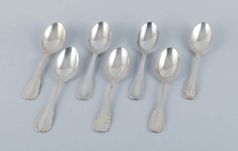 Georg Jensen, Viking, a set of seven large dinner spoons in 830 silver.: Title:Georg Jensen, Viking, a set of seven large dinner spoons in 830 silver. Description:Georg Jensen, Viking, a set of seven large dinner spoons in 830 silver. Stamped with the hallmark used between