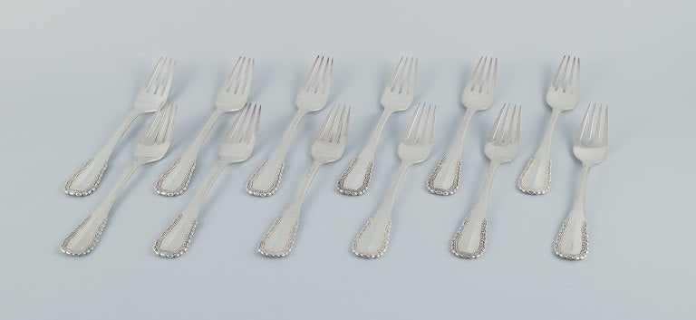 Georg Jensen, Viking, a set of twelve large dinner forks in 830 silver and sterling silver.: Title:Georg Jensen, Viking, a set of twelve large dinner forks in 830 silver and sterling silver. Description:Georg Jensen, Viking, a set of twelve large dinner forks in 830 silver and sterling silver