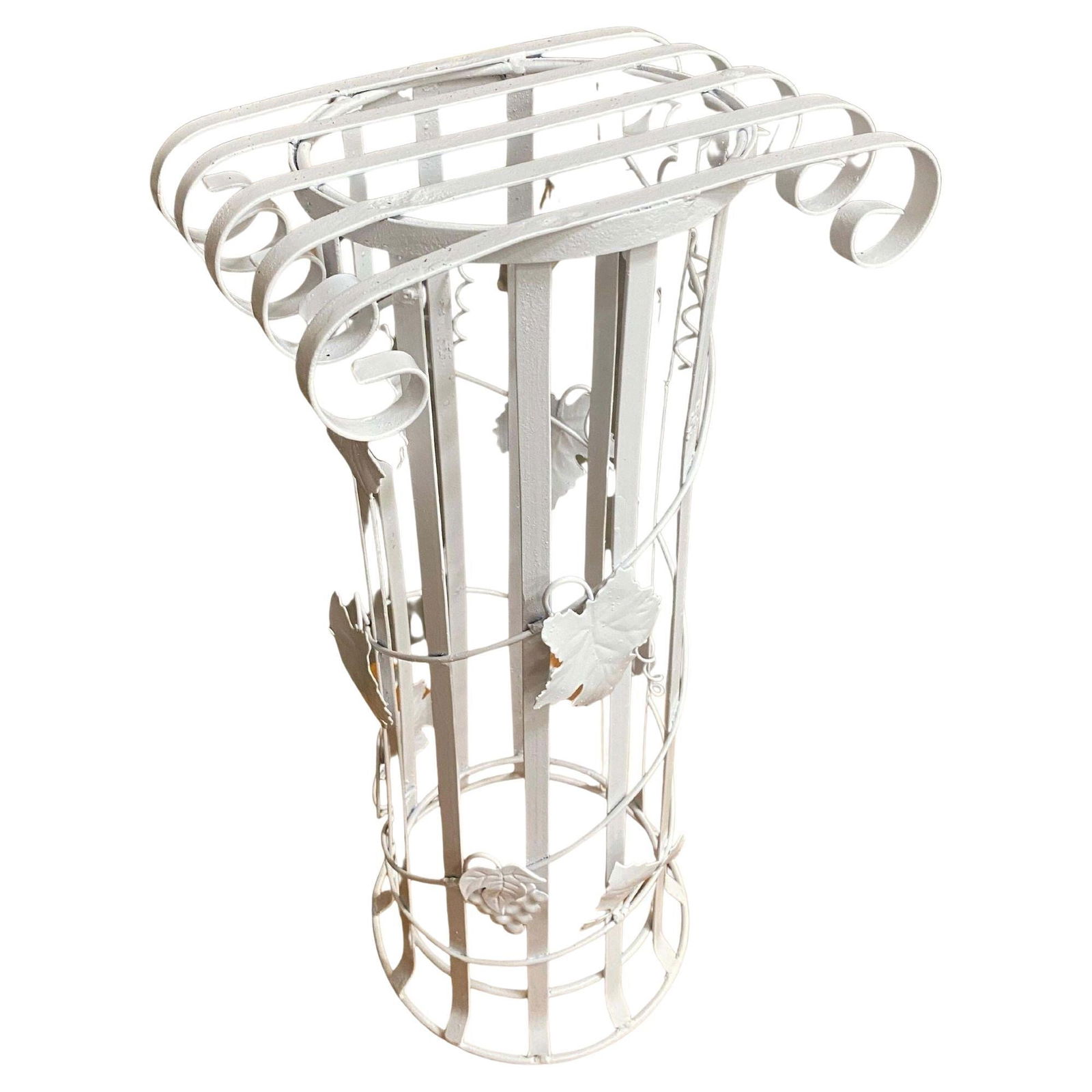 Mid Century Woodard Style Steel Strip Roman Column Plant Stand: Title: Mid Century Woodard Style Steel Strip Roman Column Plant Stand Description: Mid Century Woodard Style Steel Strip Roman Column plant stand with a decorative vine around the center. Circa 1950.