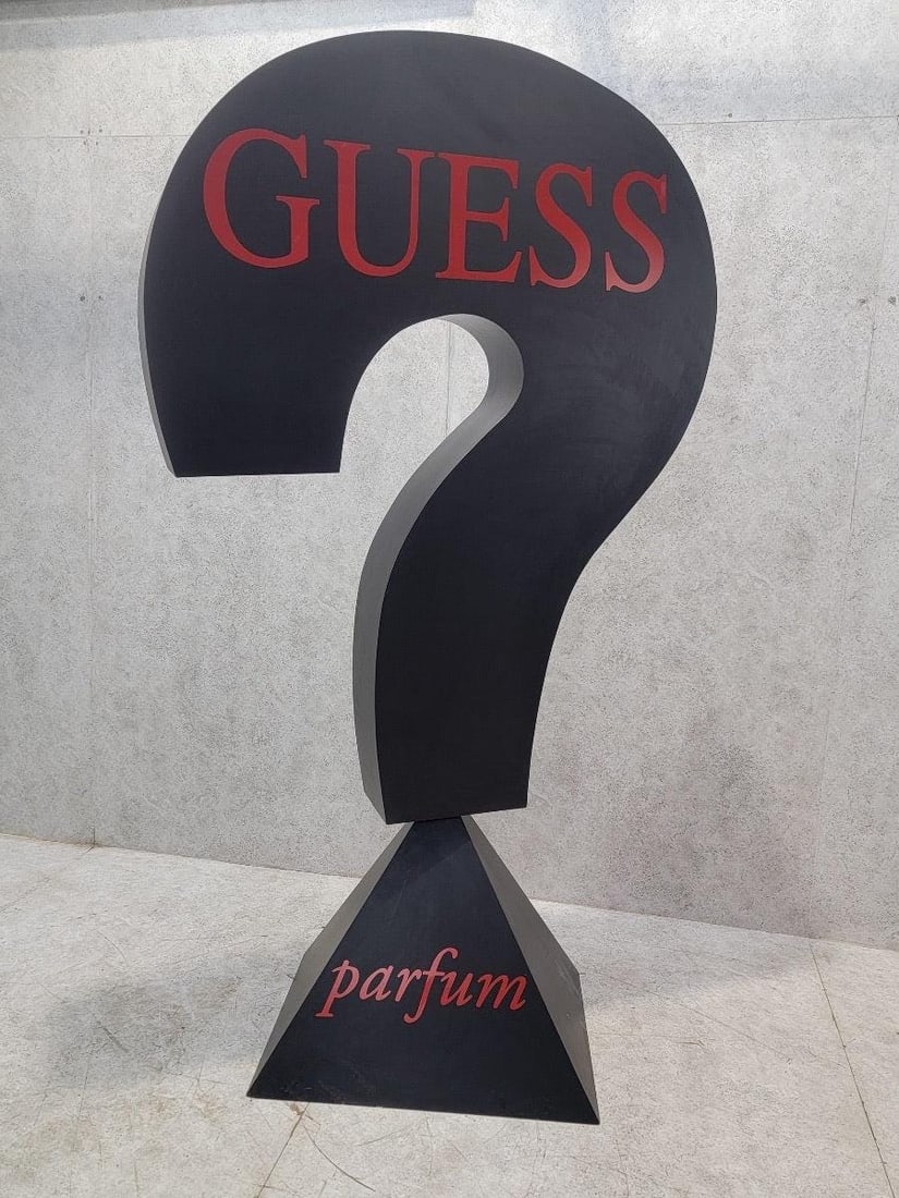 Vintage 7.5 Foot Black Wood Guess Cultural Advertising Sign: Title: Vintage 7.5 Foot Black Wood Guess Cultural Advertising Sign Description: Vintage 7.5 Foot Black Wood Guess Cultural Advertising SignVintage 7.5 foot wood black Guess Parfum signature question