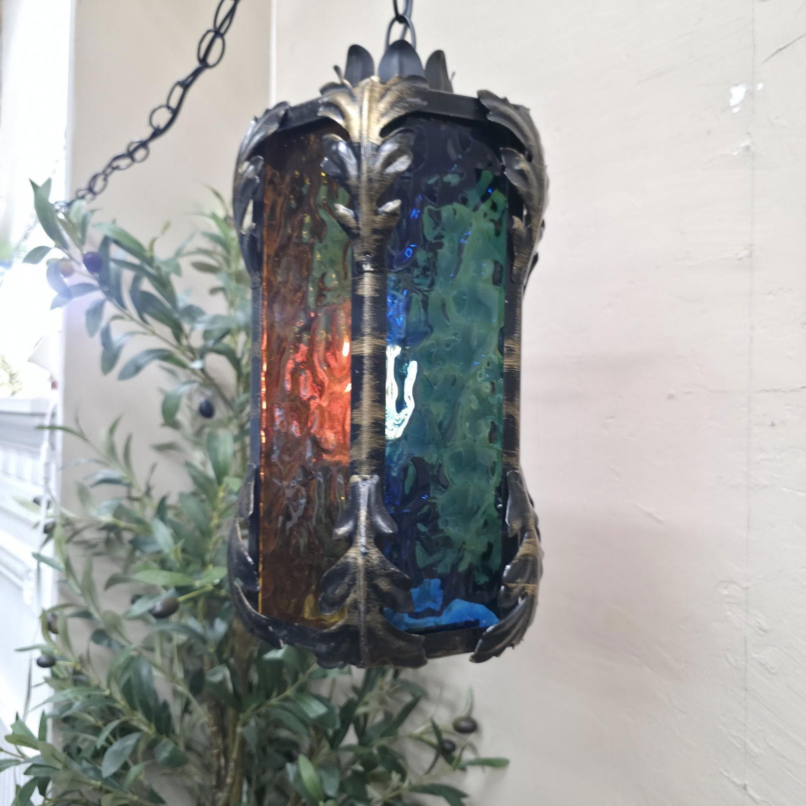 Gothic Swag Lamp Stained Glass Lantern Vintage Plug Into Wall, Blue Amber Purple Textured Glass: Title: Gothic Swag Lamp Stained Glass Lantern Vintage Plug Into Wall, Blue Amber Purple Textured Glass Newly Rewired, 12” x 7” Description: Vintage from the 1970s Materials: Glass, metal W