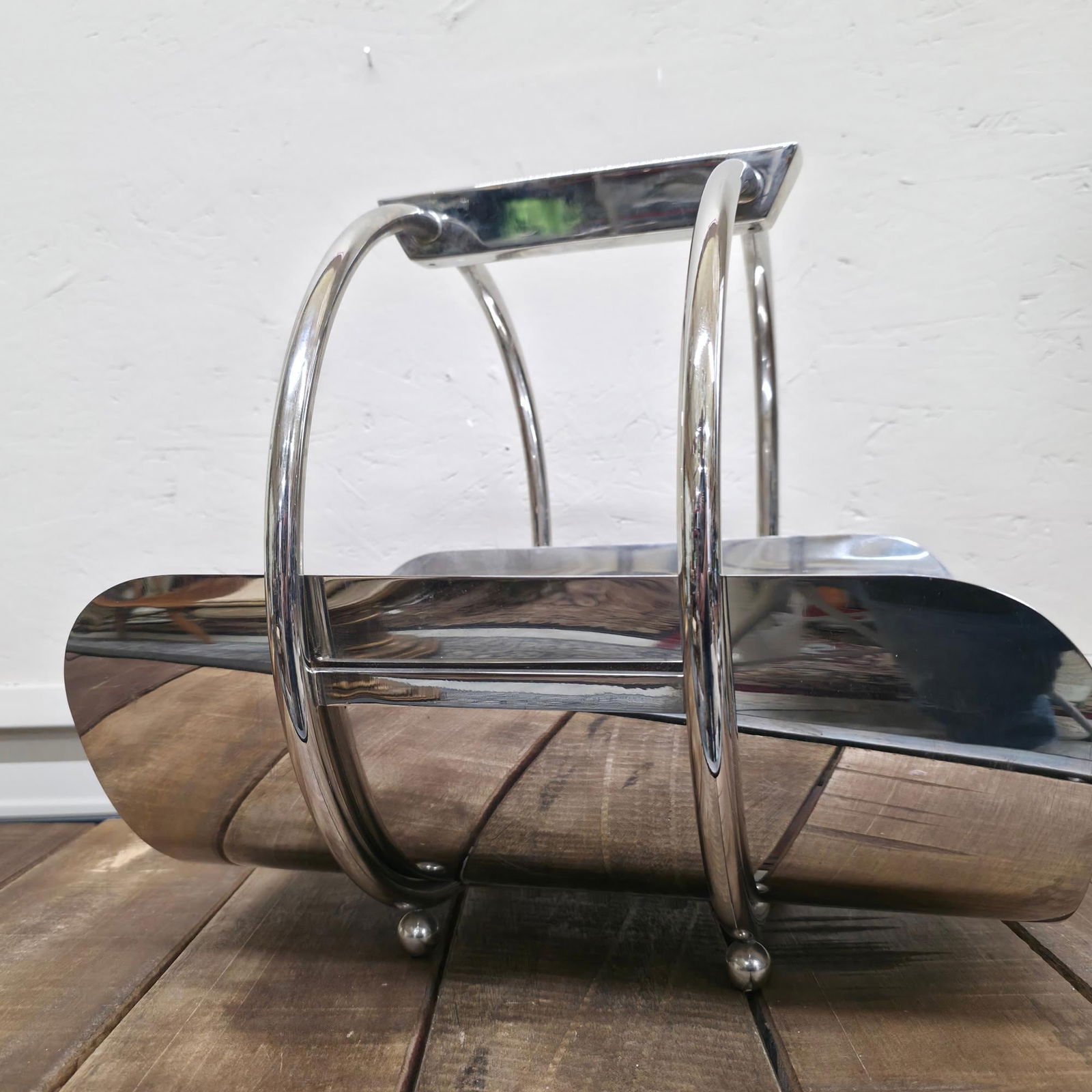 Global Views Machine Age Caddy, Chrome Magazine Rack Log Holder, Art Deco Style Modern Fireplace: Title: Global Views Machine Age Caddy, Chrome Magazine Rack Log Holder, Art Deco Style Modern Fireplace Accessory Description: Vintage Materials: Chrome, metal Sculptural chrome curves and a