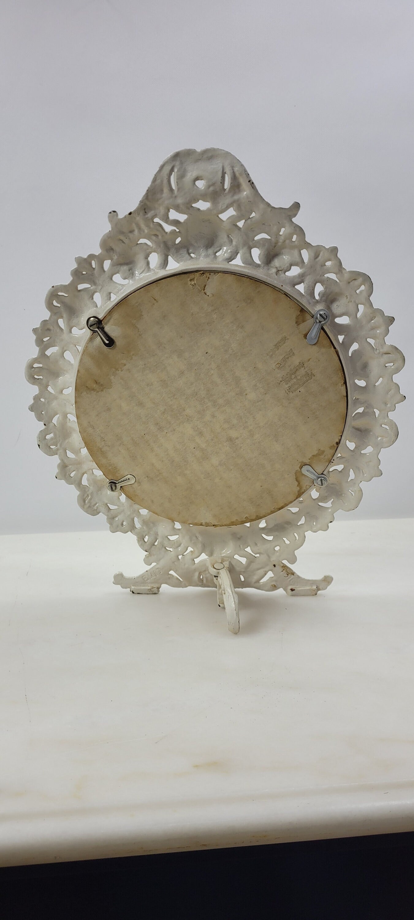 Vintage white vanity mirror cast brass round art nouveau easel back table hollywood regency: Title: Vintage white vanity mirror cast brass round art nouveau easel back table hollywood regency Description: Vintage from the 1930s Materials: metal, glass Width: 11 inches Height: 14 inches