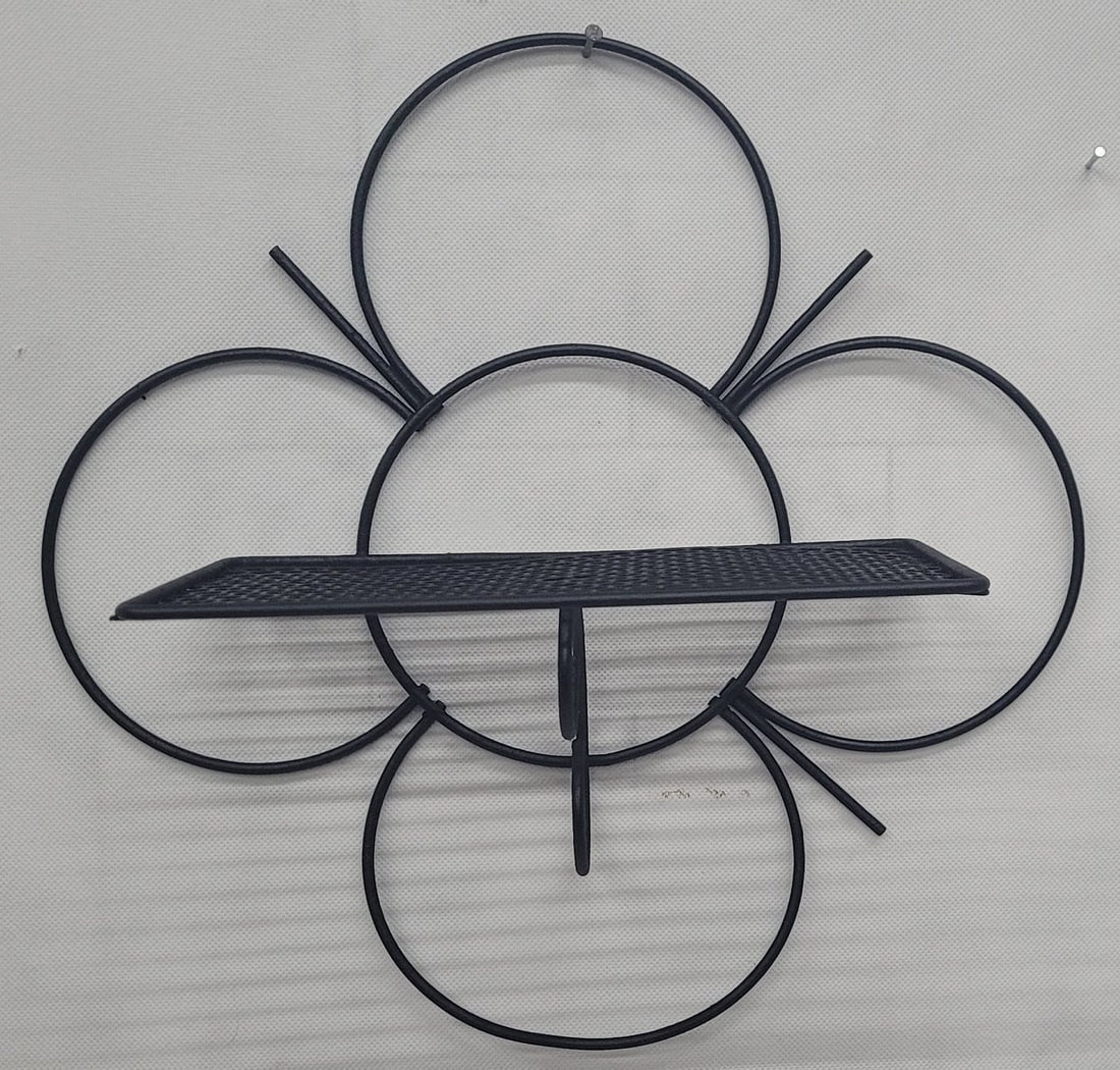 Vintage Metal Wall Shelf Mid Century Modern Atomic Mategot style Flower BOHO Retro: Title: Vintage Metal Wall Shelf Mid Century Modern Atomic Mategot style Flower BOHO Retro Description: Vintage from the 1960s Materials: Metal Width: 13 1/4 inches Height: 5 inches Vintage Black Wire