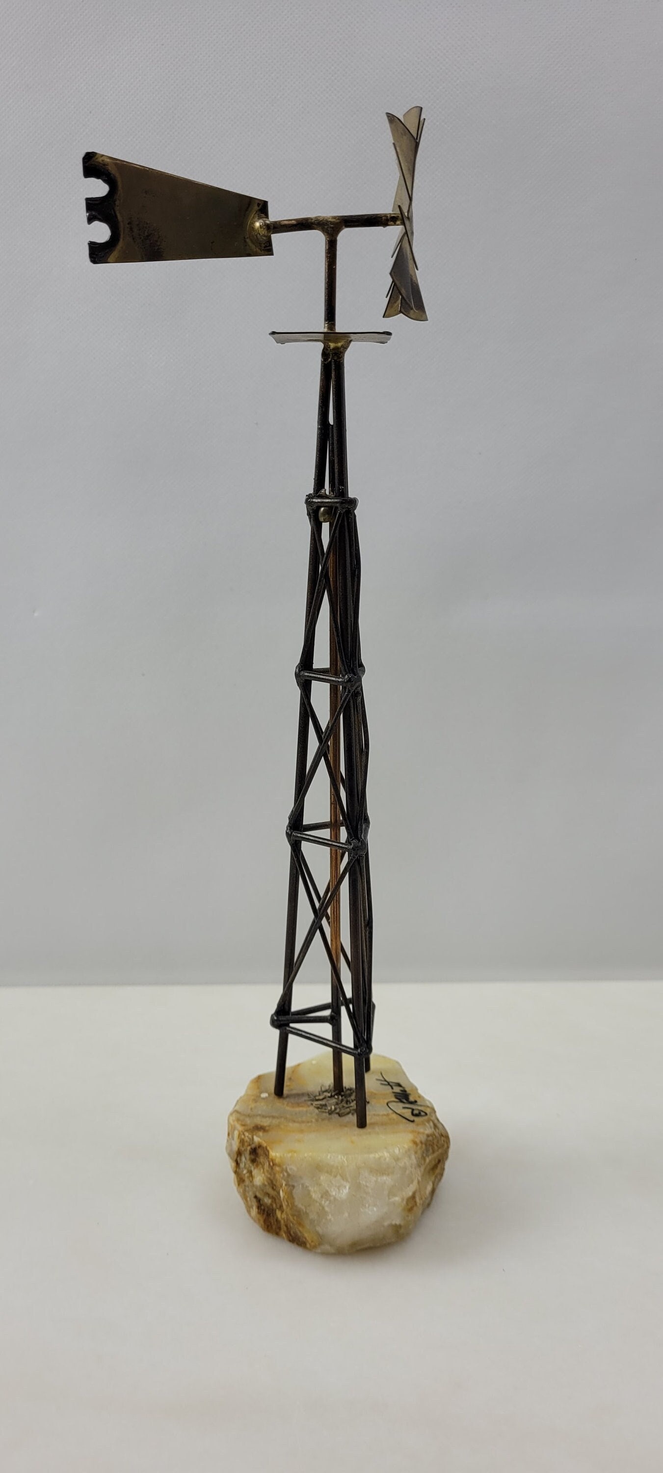 Vintage Brutalist Sculpture Signed DeMott Metal Windmill Statue on Stone Rustic Americana Desk: Title: Vintage Brutalist Sculpture Signed DeMott Metal Windmill Statue on Stone Rustic Americana Desk Tabletop Art Brass Description: Vintage from the 1970s Materials: Medium: Brass, Marble Width: 3