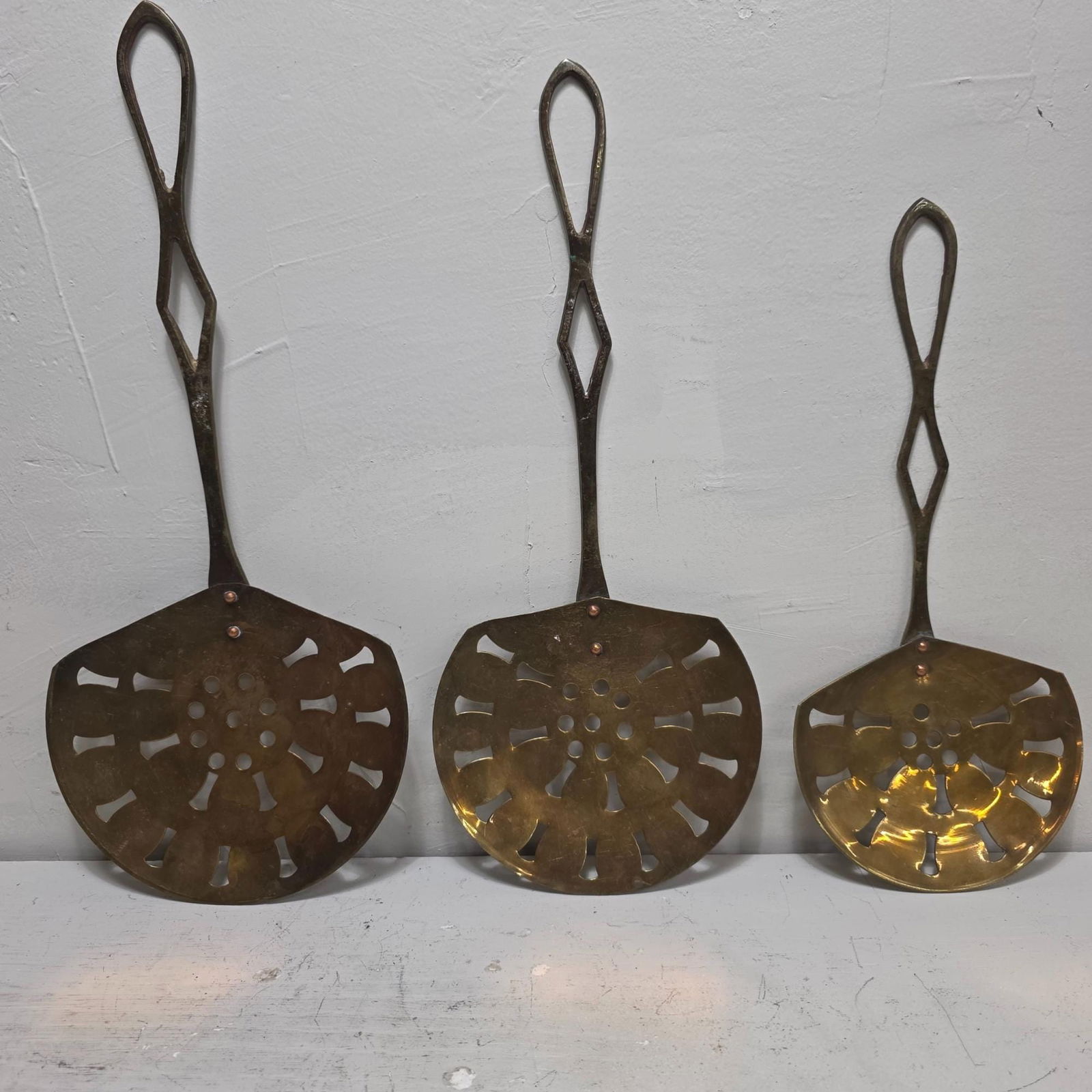 Vintage brass pierced skimmers set of three, long handled French country kitchen wall decor - 6