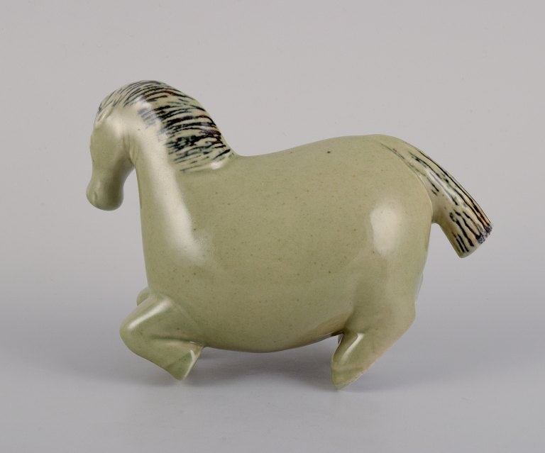 Stig Lindberg (1916-1982) for Gustavsberg. Horse figurine in glazed stoneware with a light green (1 of 3)