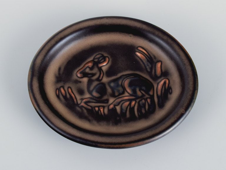 Knud Kyhn (1880-1969) for Royal Copehagen. Small ceramic dish with a motif of a reclining deer. (1 of 5)