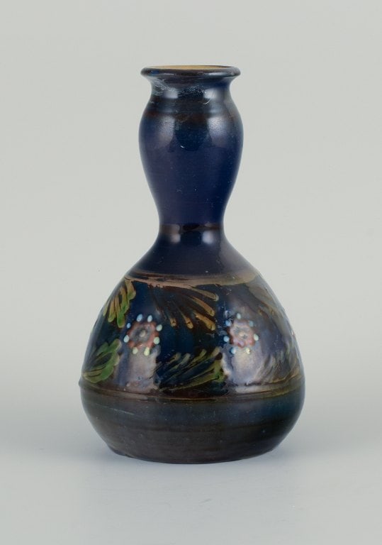 Kähler vase with blue glaze and motif of flowers and branches. (1 of 5)