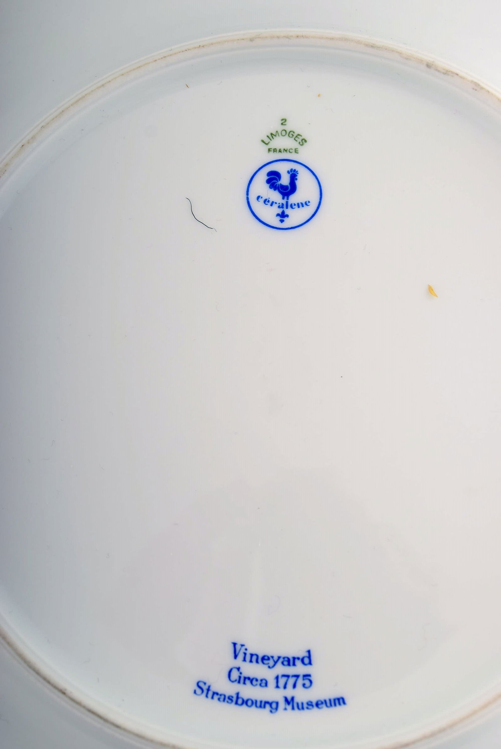 Three large Limoges porcelain plates with hand-painted grape vines and gold decoration. 1930s / 40s. - 4