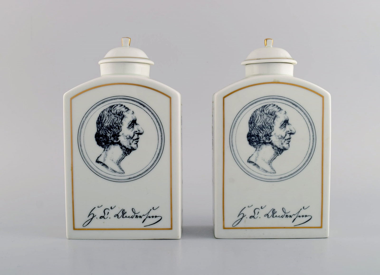 A pair of Bing & Grondahl H.C. Andersen tea caddies in porcelain with motifs from Copenhagen and: Title: A pair of Bing & Grondahl H.C. Andersen tea caddies in porcelain with motifs from Copenhagen and Odense. Description: A pair of Bing & Grondahl H.C. Andersen tea caddies in porcelain with motif