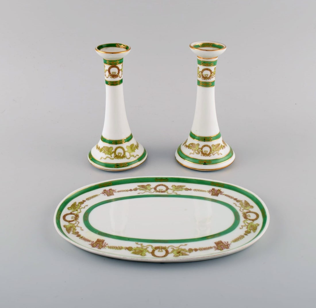 Limoges, France. Two candlesticks and a dish in hand-painted porcelain with green edge and gold (1 of 7)