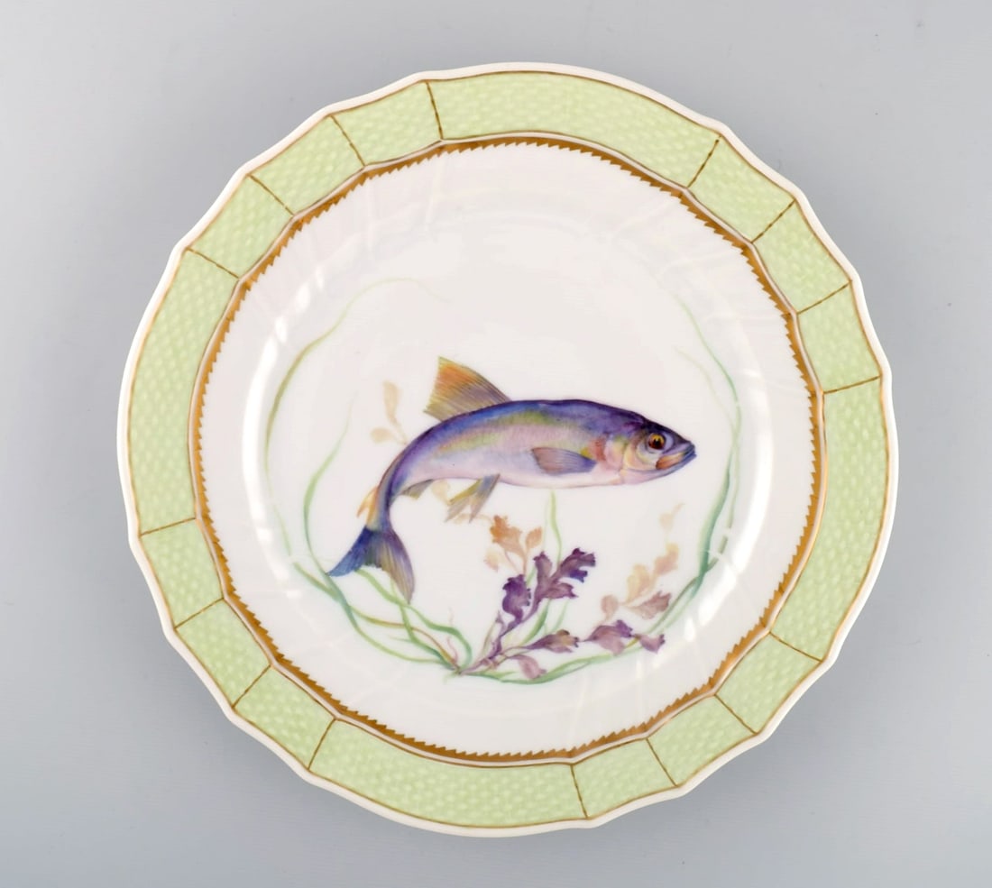 Royal Copenhagen fish plate with green edge, gold decoration and fish motif. Model 919/1710. (1 of 4)