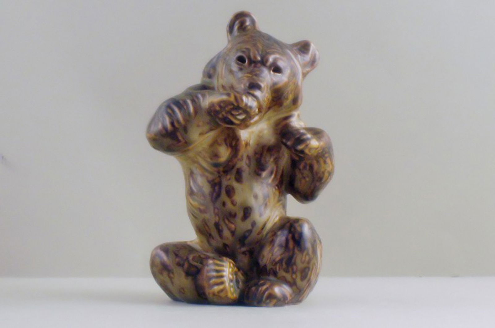 Royal Copenhagen figurine number 21675, bear sitting. (1 of 3)