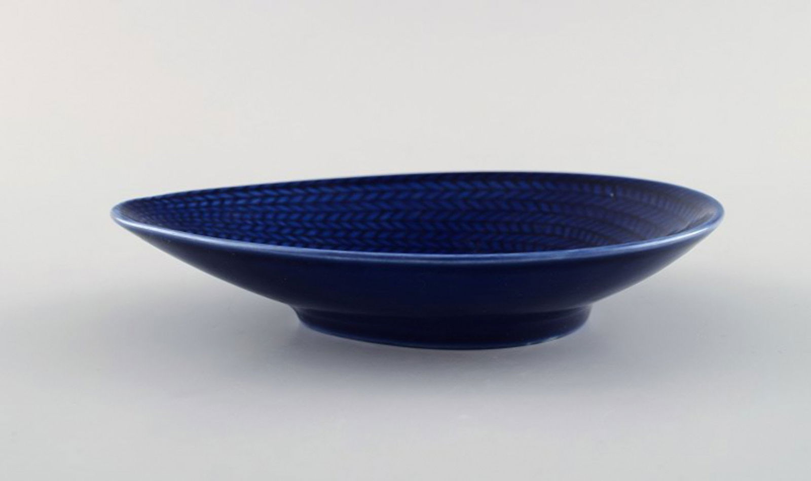 Hertha Bengtson for Rörstrand. "Blå eld" bowl in porcelain. Beautiful deep blue glaze. (1 of 4)
