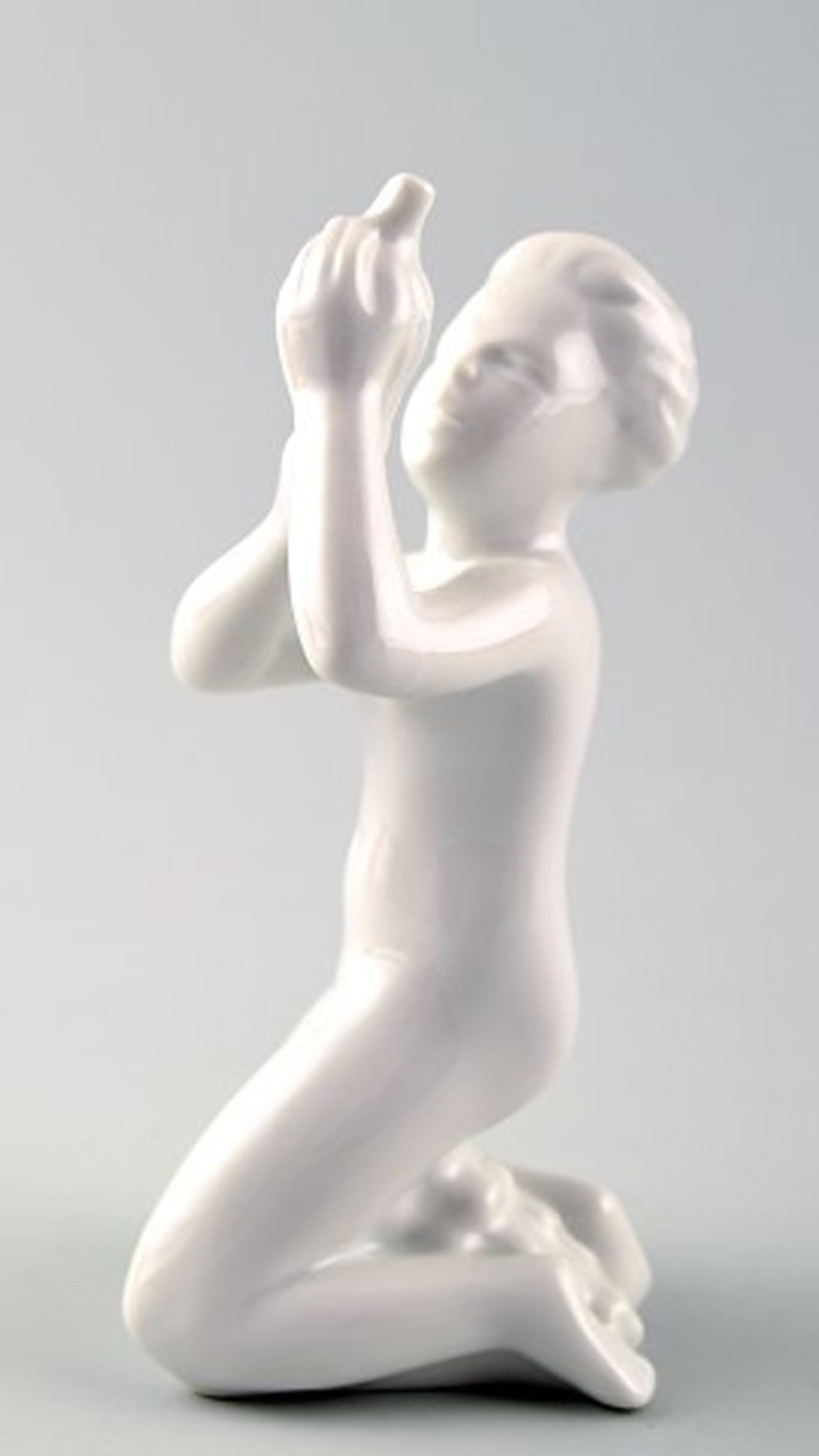 Harald Salomon for Rörstrand, white glazed figure of a sea child. - 2