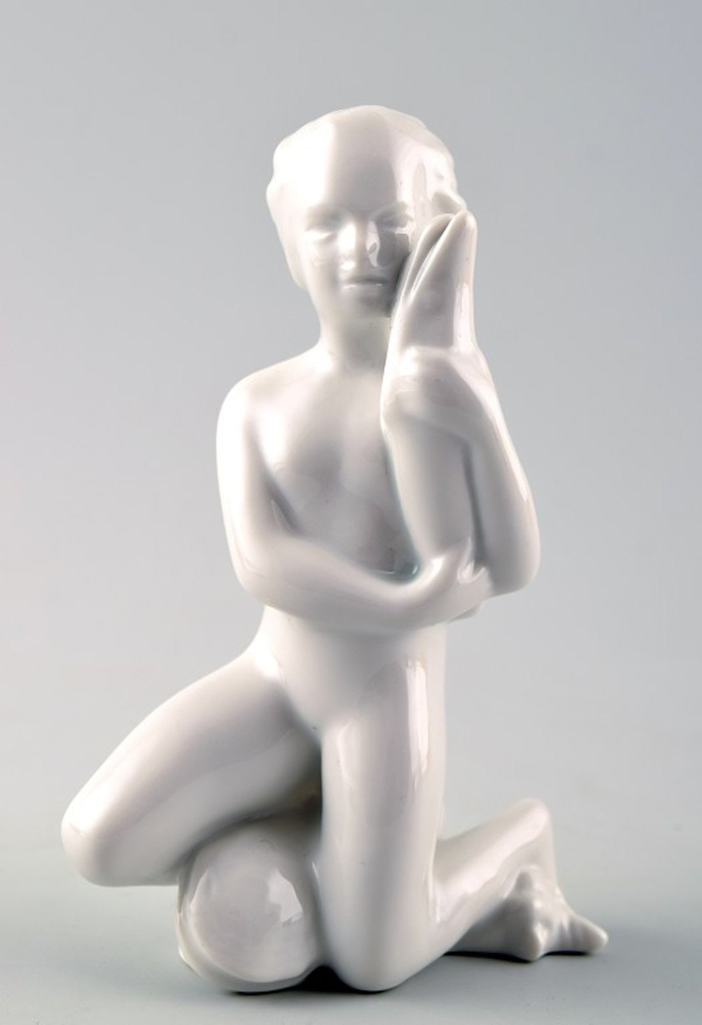 Harald Salomon for Rörstrand, white glazed figure of a sea child. (1 of 4)