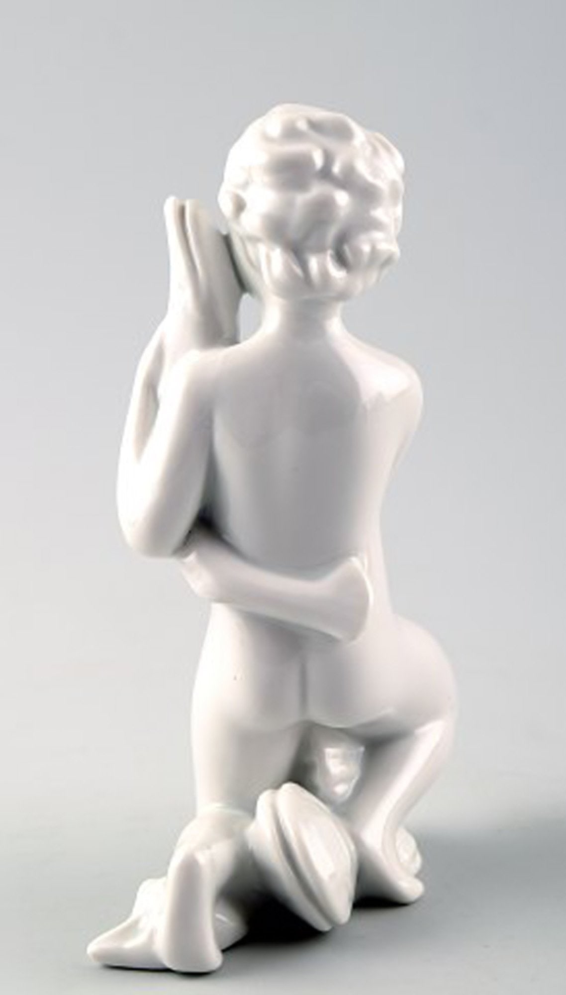 Harald Salomon for Rörstrand, white glazed figure of a sea child. - 2