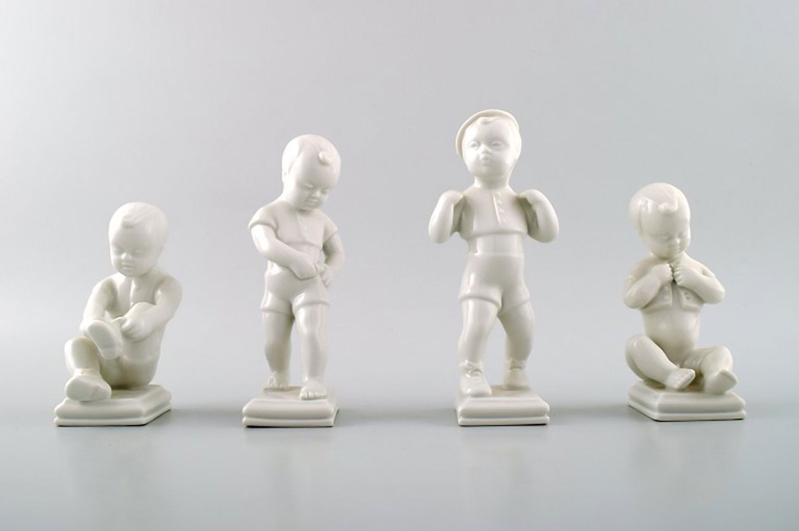 Edit Bjurström (1912-1998) for Rörstrand, Sweden. 4 boy figures in blanc de chine/white (1 of 7)