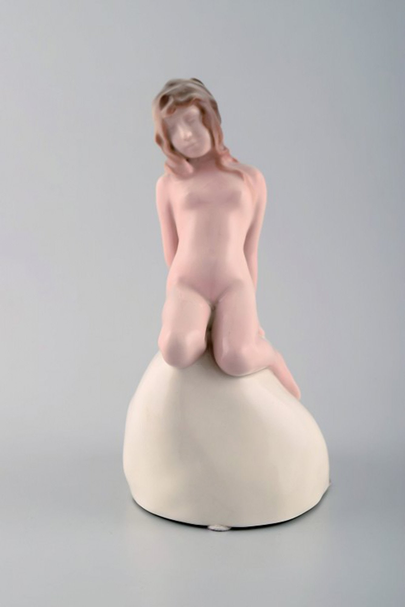 Vicken von Post for Rörstrand, Rare art deco figure in porcelain. Young woman on stone. (1 of 8)