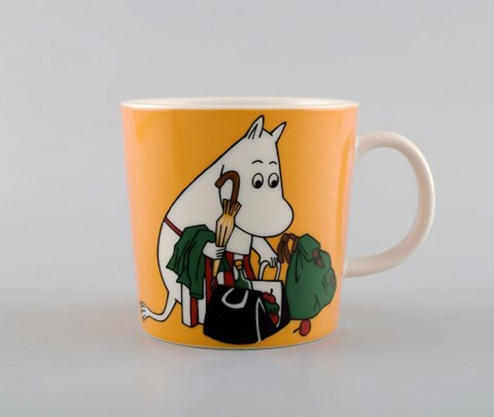 Arabia, Finland. Two cups in porcelain with motifs from "Moomin". Late 20th century. - 2