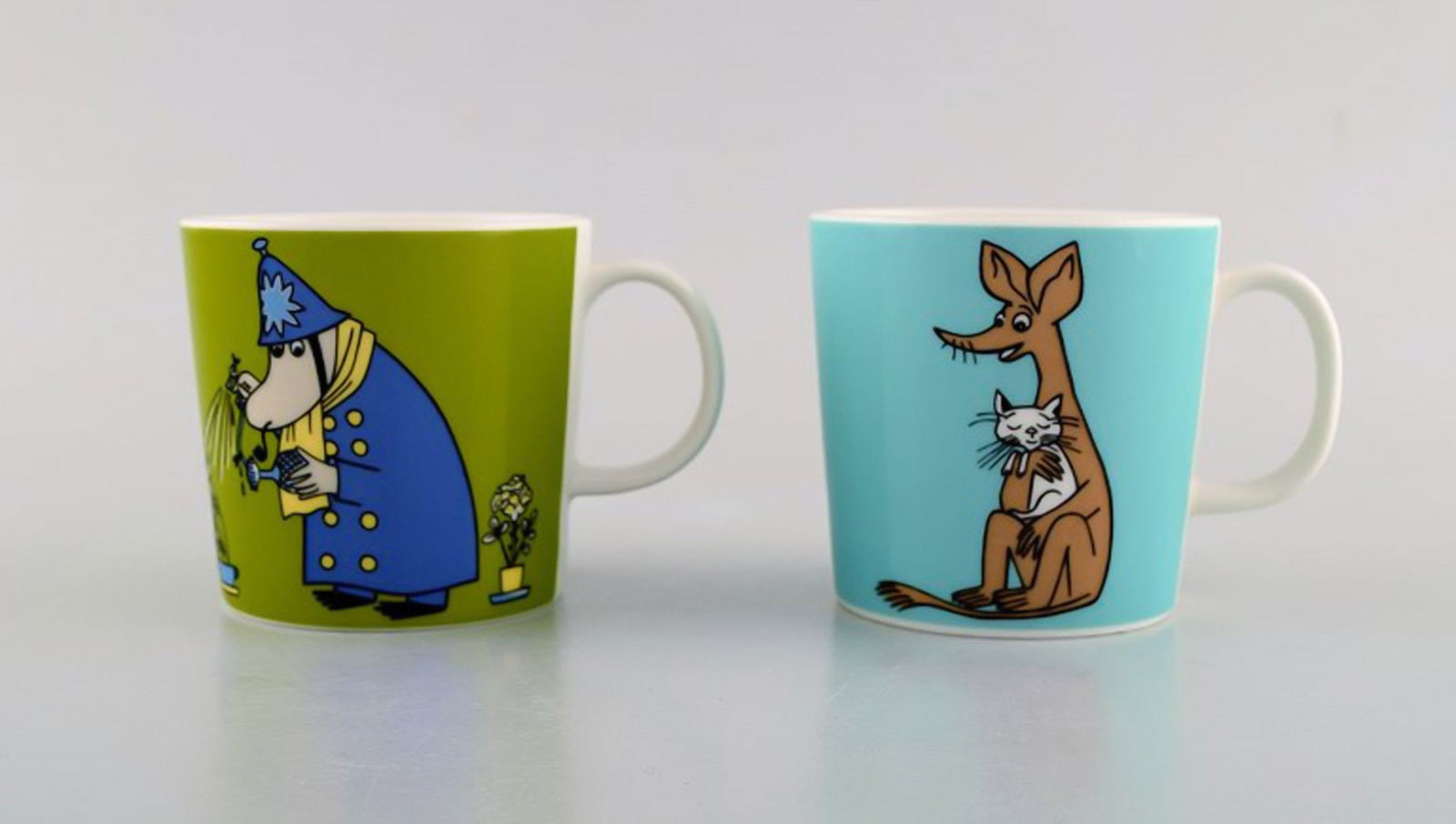 Arabia, Finland. Two cups in porcelain with motifs from "Moomin". Late 20th century. (1 of 6)