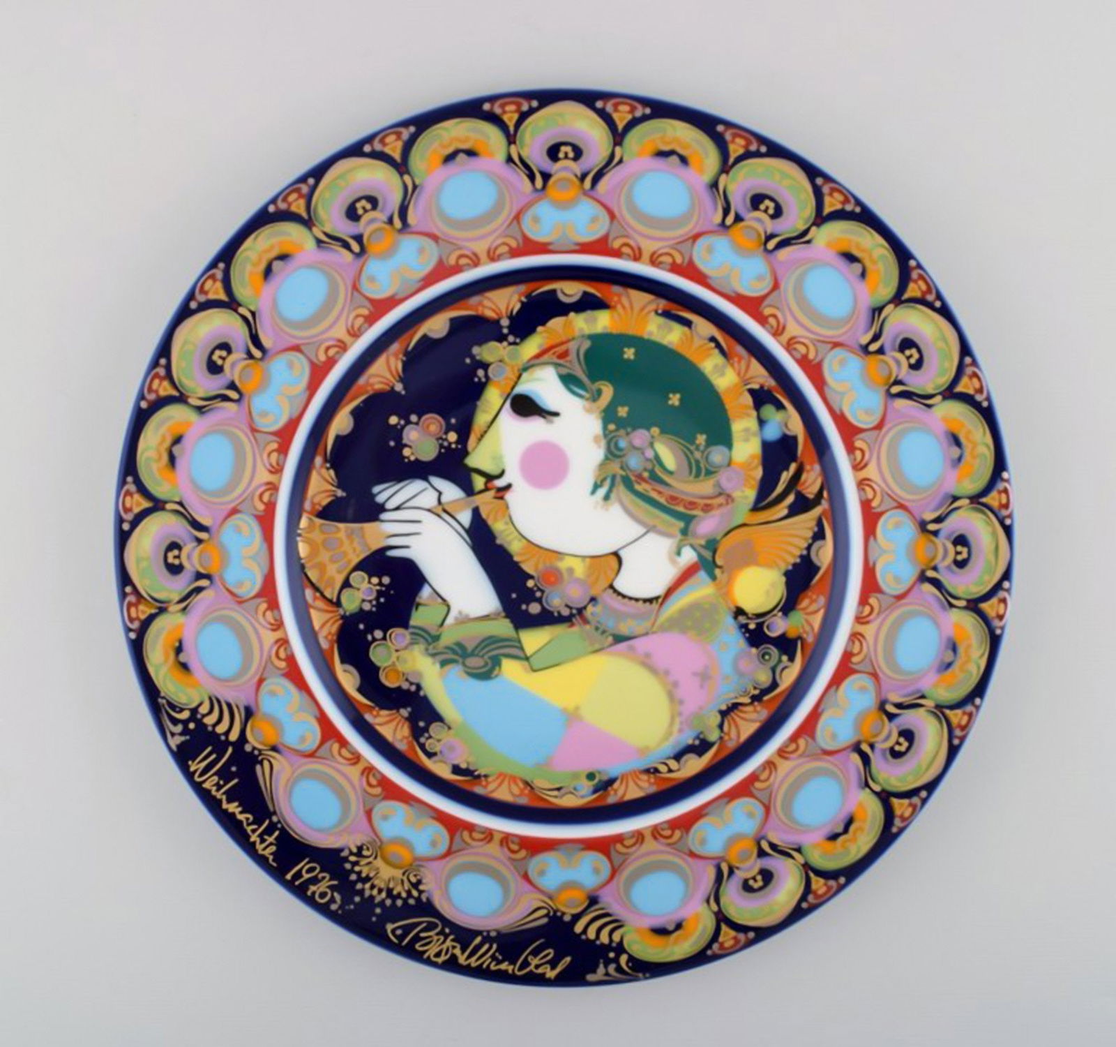 Rare hand painted Rosenthal Bjørn Wiinblad Christmas plate from 1976. "Angel with trumpet".: Title: Rare hand painted Rosenthal Bjørn Wiinblad Christmas plate from 1976. "Angel with trumpet". Description: Rare hand painted Rosenthal Bjørn Wiinblad Christmas plate from 1976. "Angel