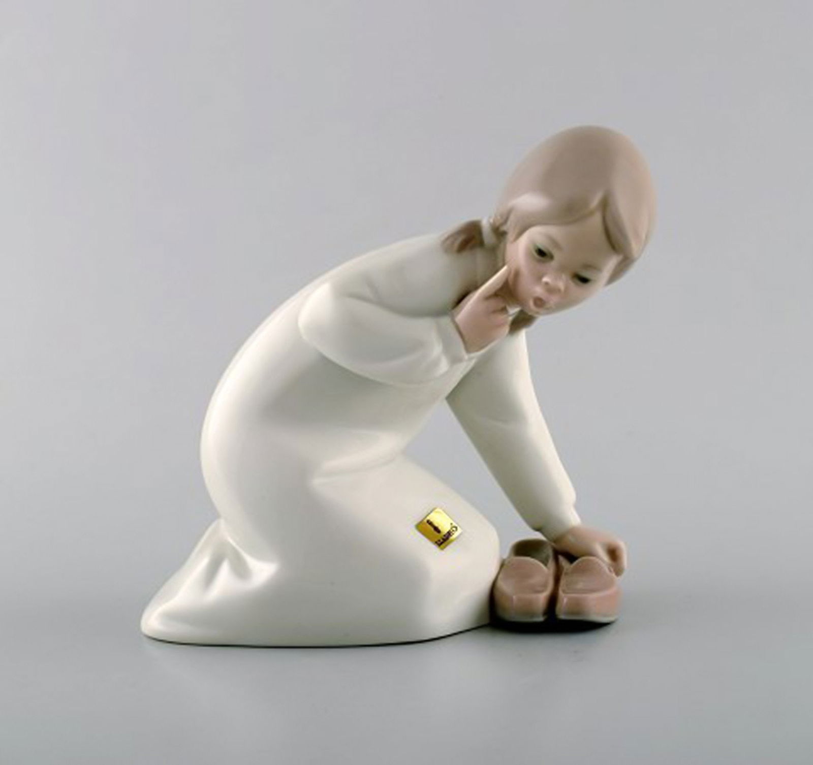 Lladro, Spain. Two child figures in glazed porcelain. 20th century. - 2