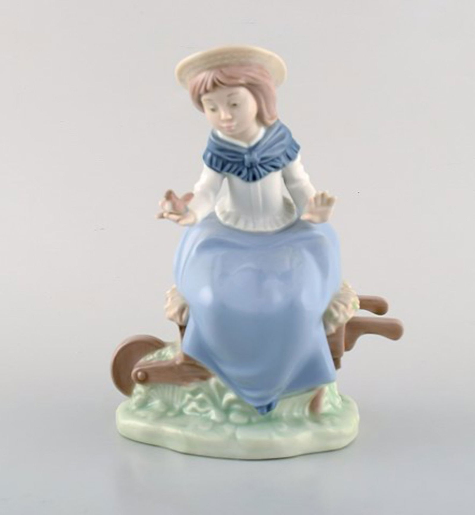 Lladro and Nao, Spain. Four porcelain figurines of children. 1980 / 90's. - 2