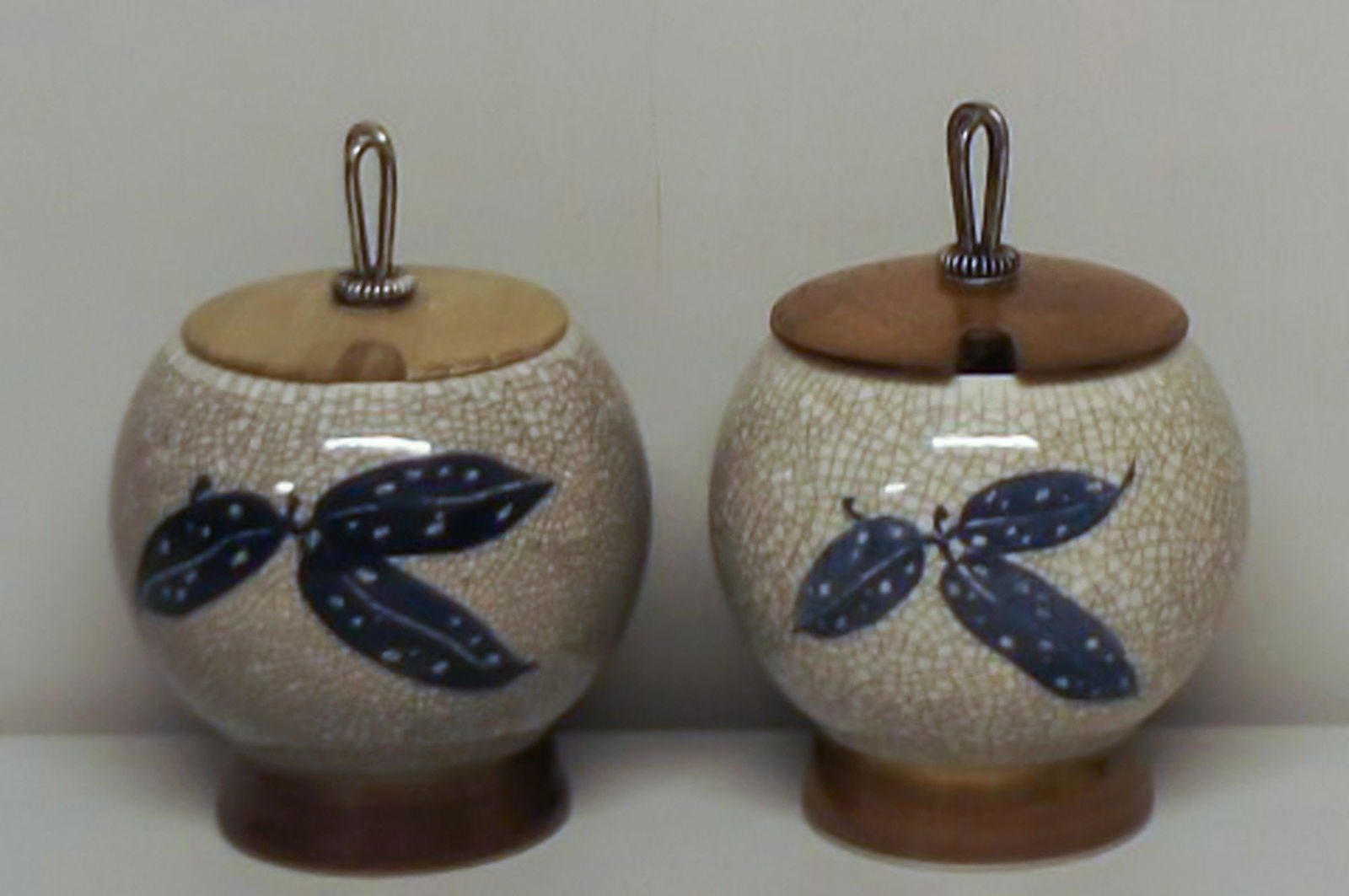 A pair of Art Deco B & G (Bing & Grondahl) Craquelé vases with lids in wood and silver. (1 of 5)