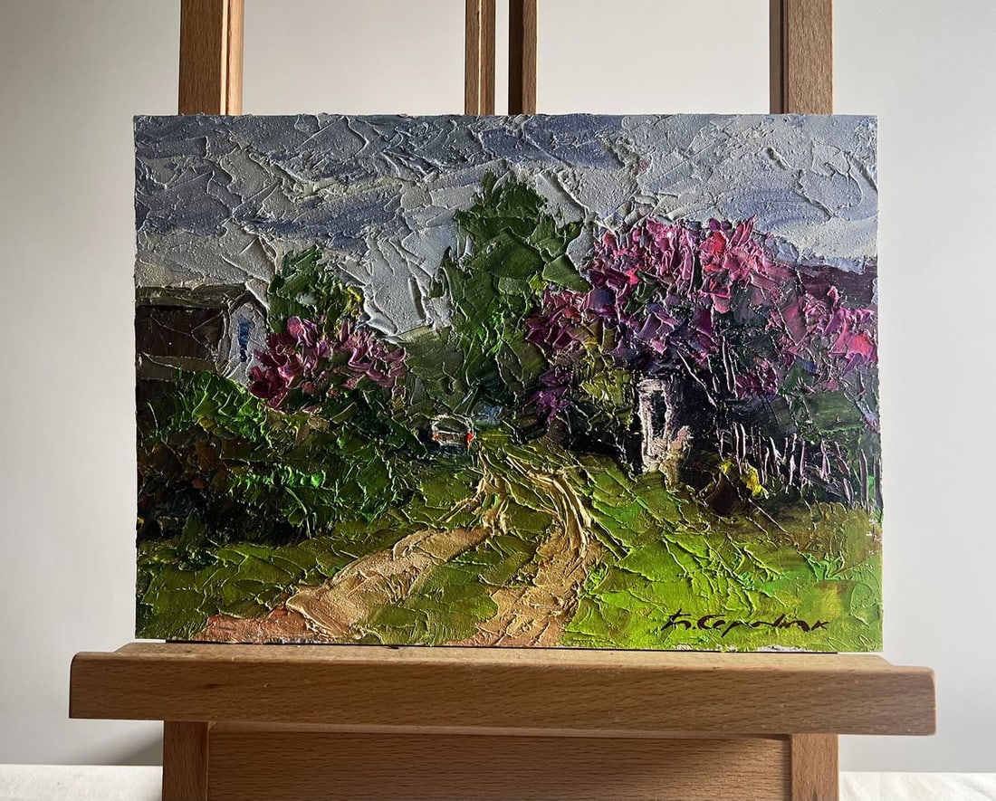 Oil painting Lilac growing in the village Boris Serdyuk: Title: Oil painting Lilac growing in the village Boris Serdyuk Description: NoAAA3726The oil painting on cardboard, titled "Lilac Growing in the Village", captures a peaceful rural scene, where
