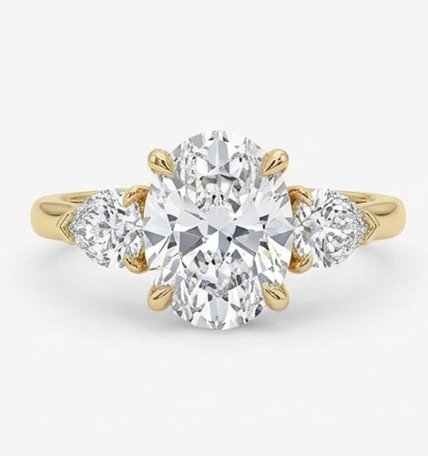 5 Ct Lab Grown Diamond Oval Three-Stone with Pear Side Stones Ring in 14K Yellow Gold: Title: 5 Ct Lab Grown Diamond Oval Three-Stone with Pear Side Stones Ring in 14K Yellow Gold Description: Stunning 5 carat lab grown diamond ring featuring a Oval Three-Stone with Pear Side Stones