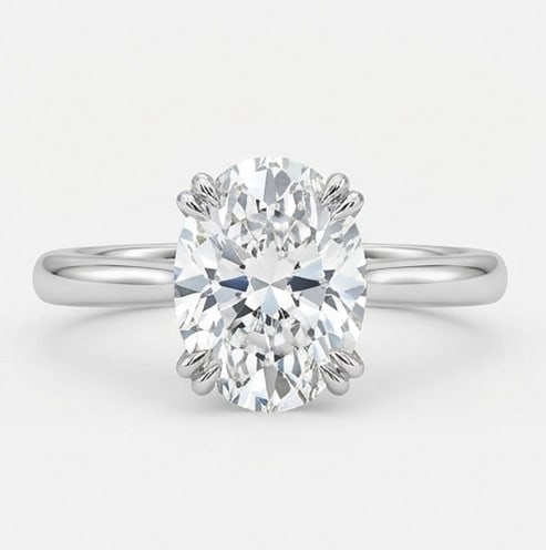 10 Ct Lab Grown Diamond Oval Classic Solitaire Ring in 14K White Gold: Title: 10 Ct Lab Grown Diamond Oval Classic Solitaire Ring in 14K White Gold Description: Stunning 10 carat lab grown diamond ring featuring a Oval Classic Solitaire design. The center stone is