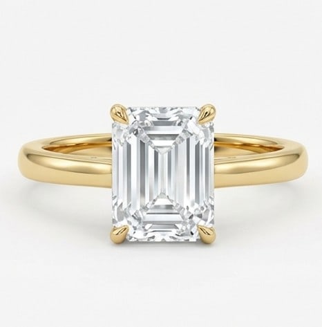 8 Ct Lab Grown Diamond Emerald Cut Solitaire Ring in 14K Yellow Gold: Title: 8 Ct Lab Grown Diamond Emerald Cut Solitaire Ring in 14K Yellow Gold Description: Stunning 8 carat lab grown diamond ring featuring a Emerald Cut Solitaire design. The center stone is beautiful