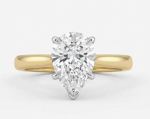 4 Ct Lab Grown Diamond Pear Shape Solitaire (White Gold Prongs) Ring in 14K Yellow Gold: Title: 4 Ct Lab Grown Diamond Pear Shape Solitaire (White Gold Prongs) Ring in 14K Yellow Gold Description: Stunning 4 carat lab grown diamond ring featuring a Pear Shape Solitaire (White Gold Prongs)
