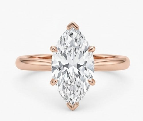 5 Ct Lab Grown Diamond Marquise Solitaire with V-Prongs Ring in 14K Rose Gold: Title: 5 Ct Lab Grown Diamond Marquise Solitaire with V-Prongs Ring in 14K Rose Gold Description: Stunning 5 carat lab grown diamond ring featuring a Marquise Solitaire with V-Prongs design. The cente