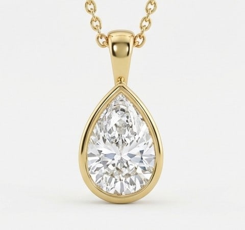 5 Ct Lab Grown Diamond Pear Shape Bezel Set Solitaire Pendant in 14K Yellow Gold: Title: 5 Ct Lab Grown Diamond Pear Shape Bezel Set Solitaire Pendant in 14K Yellow Gold Description: Stunning 5 carat lab grown diamond pendant featuring a Pear Shape Bezel Set Solitaire design. The c