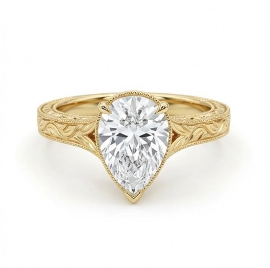 5 Ct Lab Grown Diamond Pear Shape Vintage Engraved Solitaire Ring in 14K Yellow Gold: Title: 5 Ct Lab Grown Diamond Pear Shape Vintage Engraved Solitaire Ring in 14K Yellow Gold Description: Stunning 5 carat lab grown diamond ring featuring a Pear Shape Vintage Engraved Solitaire desig