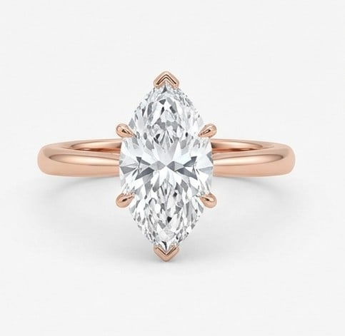 5 Ct Lab Grown Diamond Marquise Solitaire with V-Prongs Ring in 14K Rose Gold: Title: 5 Ct Lab Grown Diamond Marquise Solitaire with V-Prongs Ring in 14K Rose Gold Description: Stunning 5 carat lab grown diamond ring featuring a Marquise Solitaire with V-Prongs design. The cente