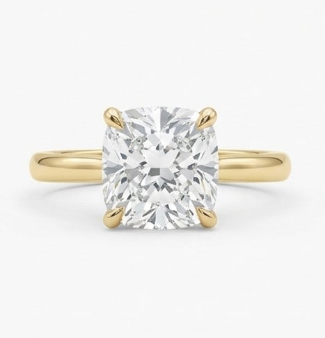 6 Ct Lab Grown Diamond Cushion Cut Classic Solitaire Ring in 14K Yellow Gold: Title: 6 Ct Lab Grown Diamond Cushion Cut Classic Solitaire Ring in 14K Yellow Gold Description: Stunning 6 carat lab grown diamond ring featuring a Cushion Cut Classic Solitaire design. The center st