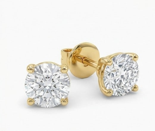 4 Ct Lab Grown Diamond Round Brilliant Cut Studs Ring in 14K Yellow Gold: Title: 4 Ct Lab Grown Diamond Round Brilliant Cut Studs Ring in 14K Yellow Gold Description: Stunning 4 carat lab grown diamond ring featuring a Round Brilliant Cut Studs design. The center stone is b