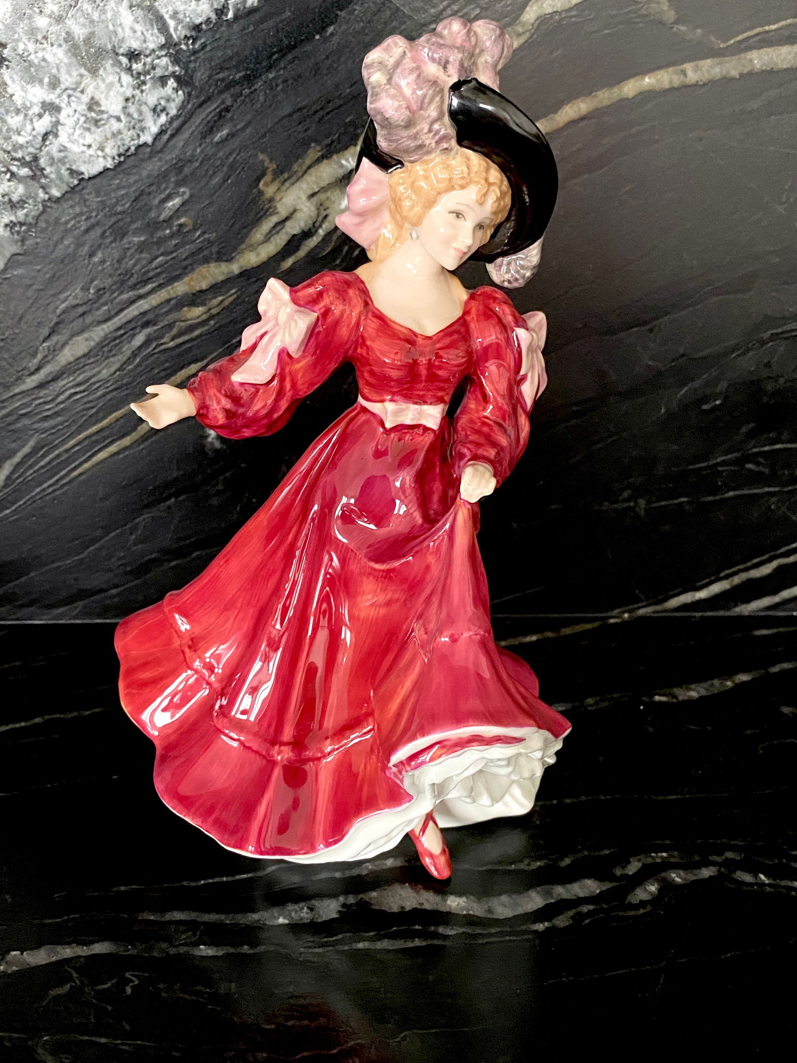 Royal Doulton English Porcelain Figurine, "Patricia": Title: Royal Doulton English Porcelain Figurine, "Patricia"Maker:Valerie AnnandOrigin: EnglandDate/Period:20th centuryMaterials:PorcelainSize:14 x 13 x 23 cmDescription:FIGURE OF THE YEAR, Patricia,